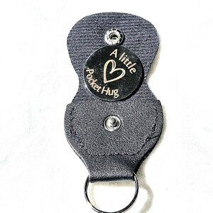 A Little Pocket Hug - key chain Coin in faux leather holder.